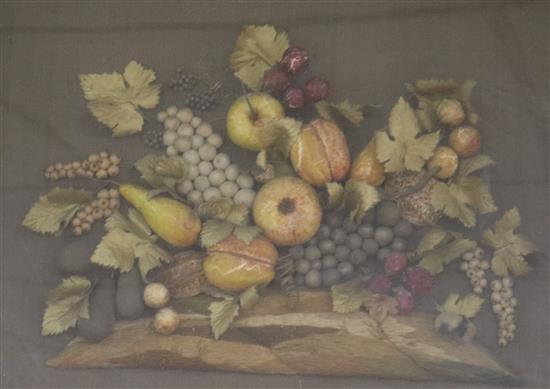 A painted wax relief still life study of fruit, framed 33 x 36cm